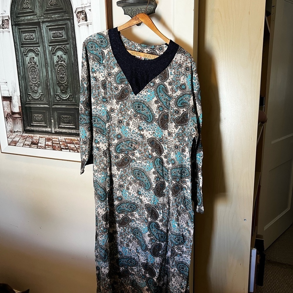 Vintage dress sized 3x. It would be a smaller 3x.
